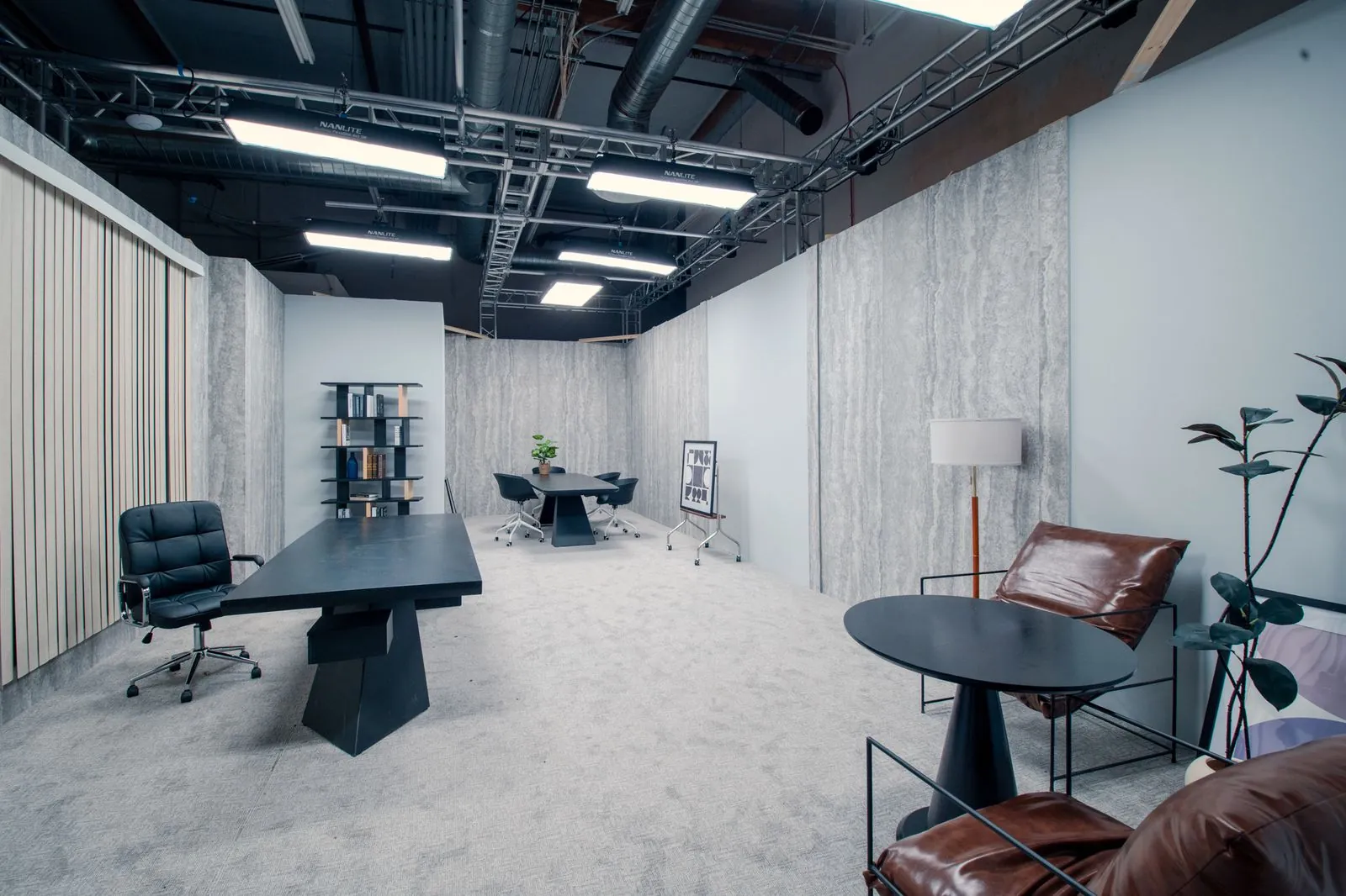 Private office looking through to the conference table and lounge seating