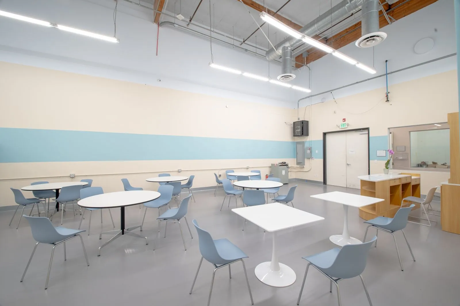 Cafeteria looking toward the doors and serving window