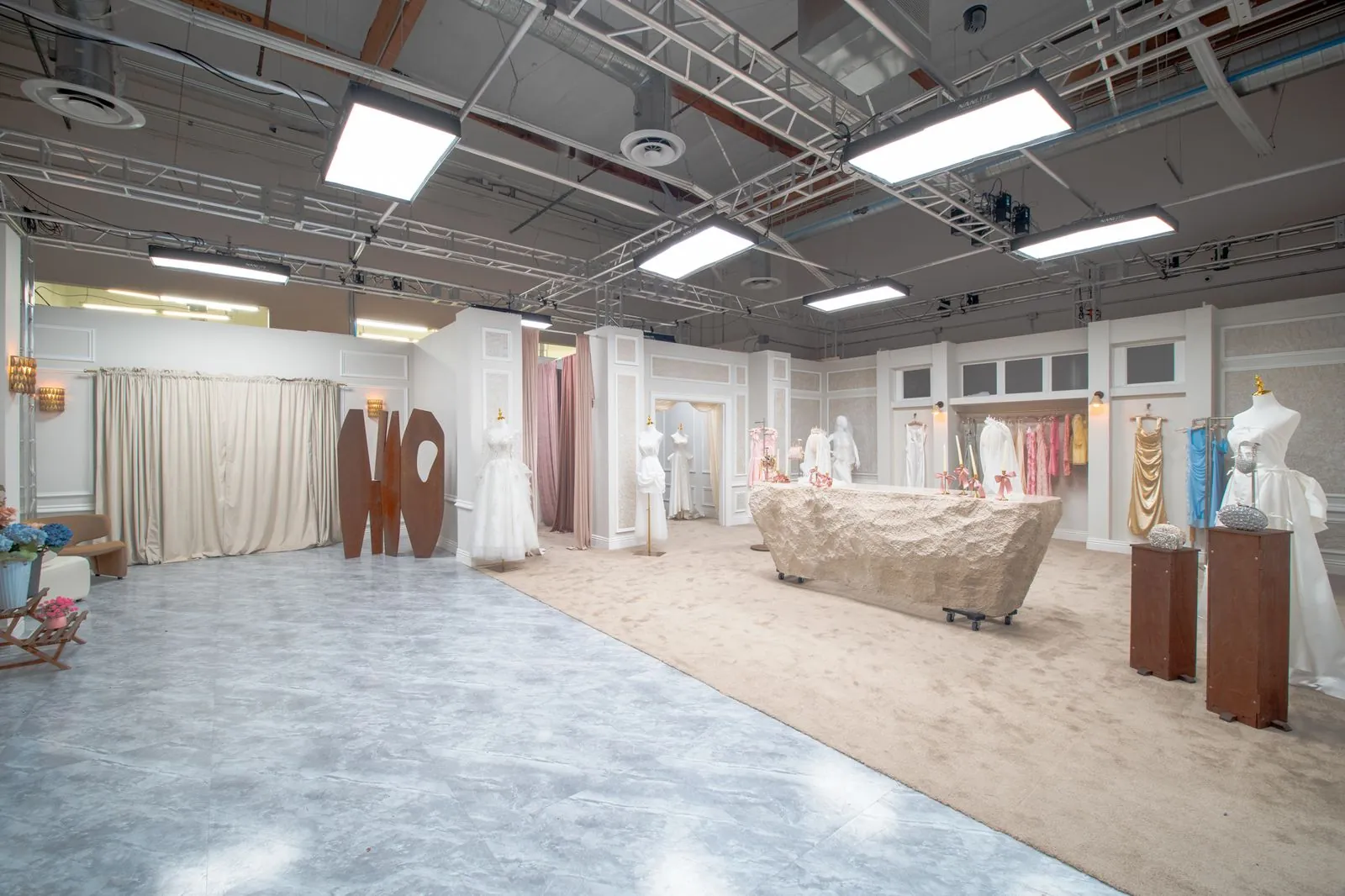 Bridal boutique looking toward the fitting-room curtains